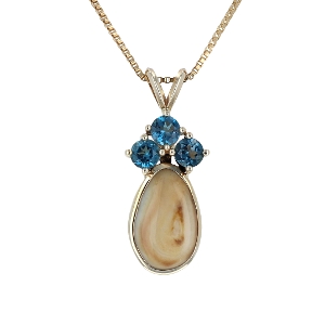 Elk Ivory Pendant with Blue Topaz